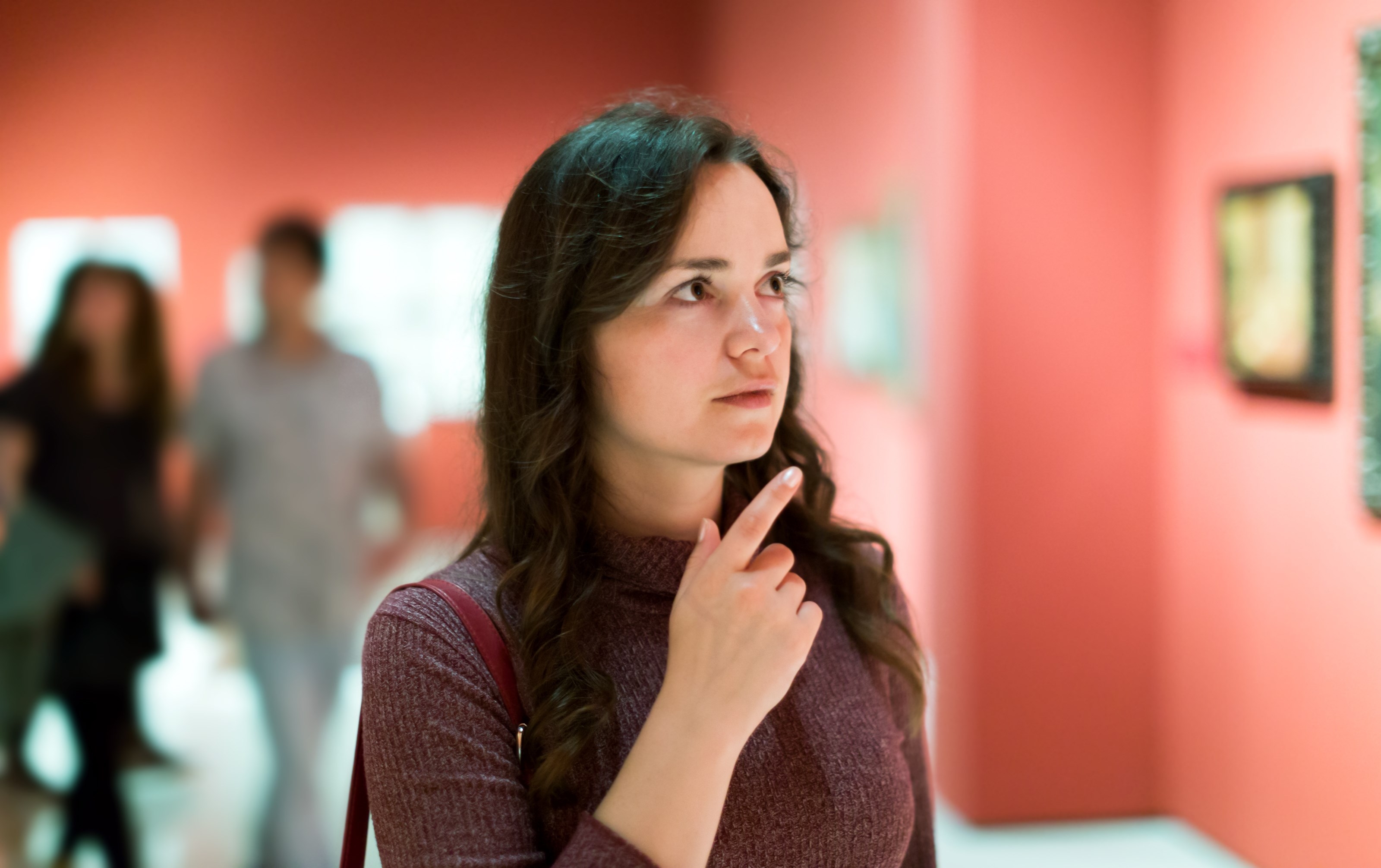 Girl looking at art