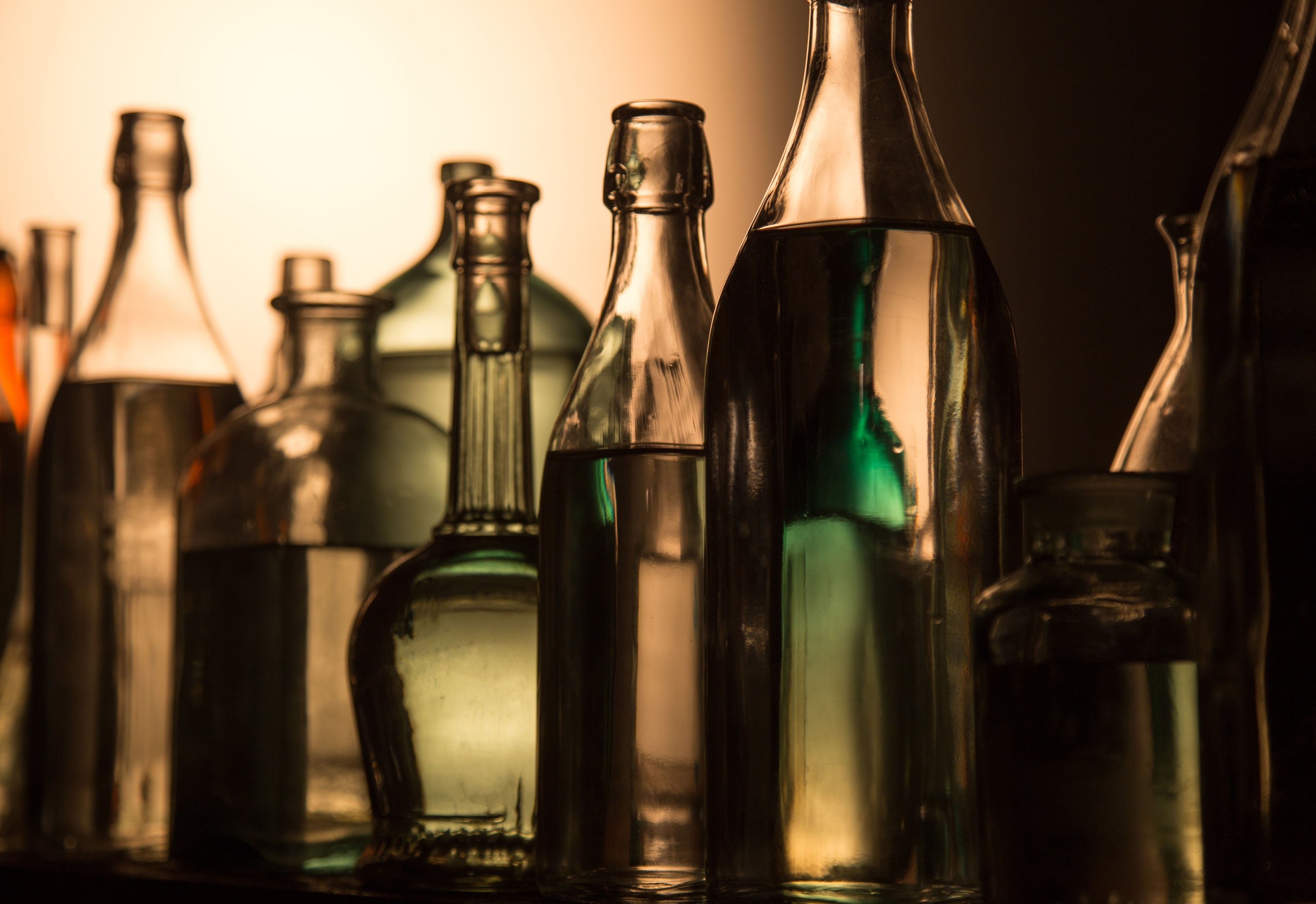 Still Life of Bottles in the homemade distillery cellar.