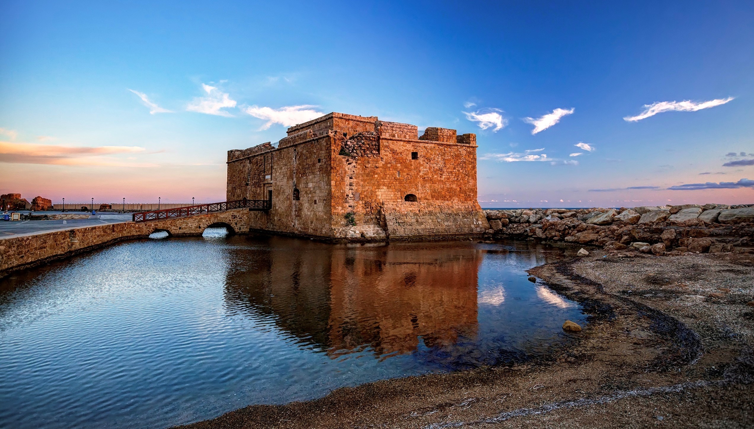 The castle of Pafos early in the morning with reflection on the water, Cyprus