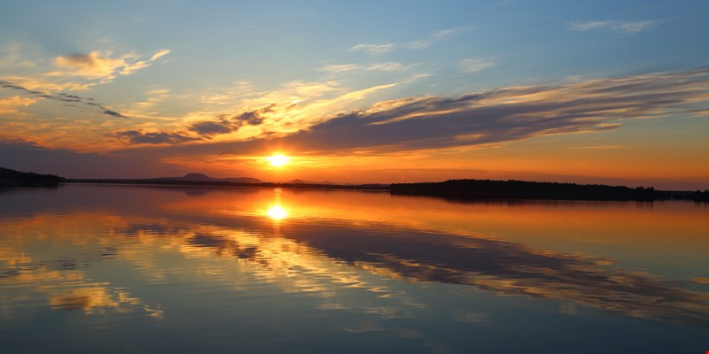 sun kissing the horizon