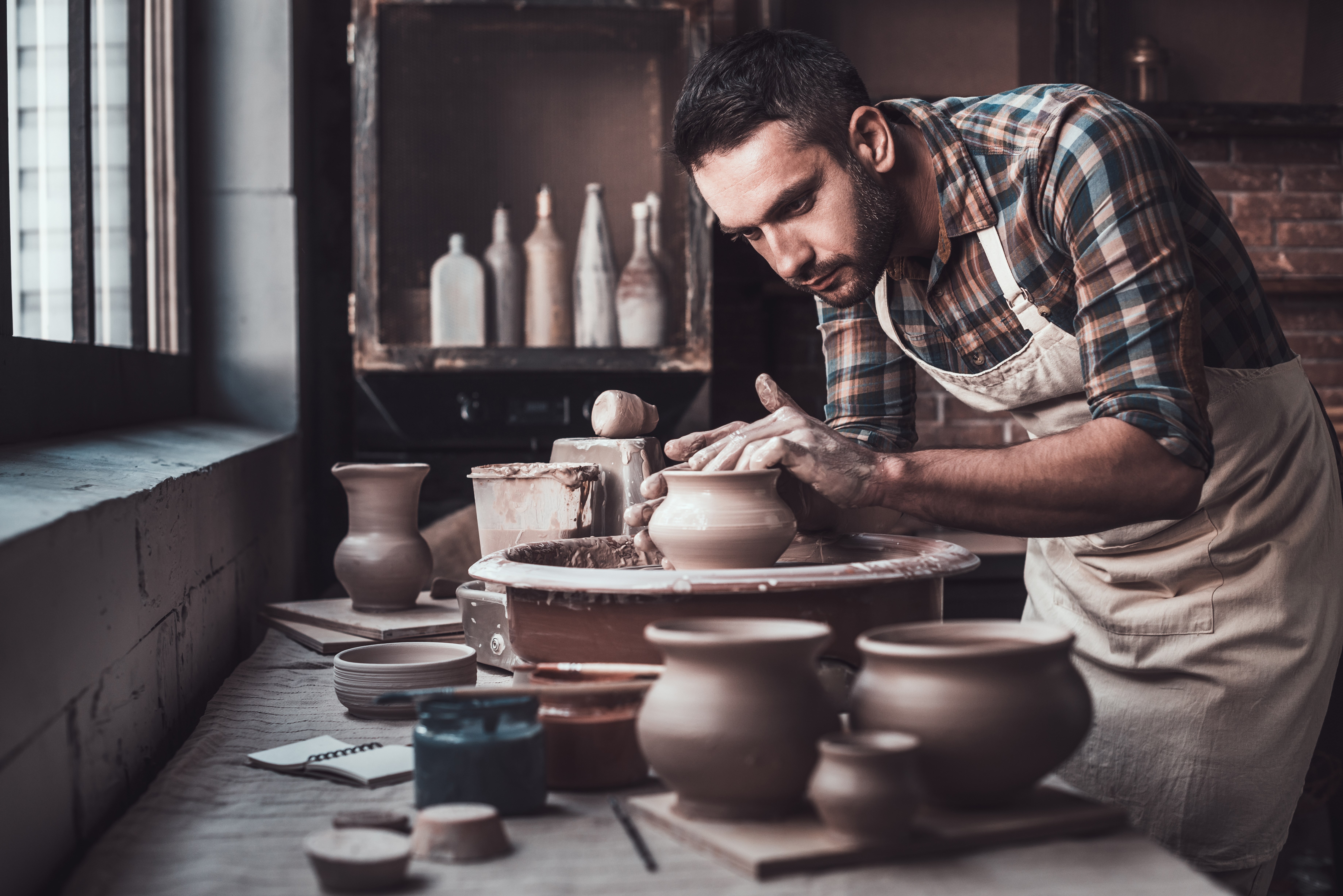 Man making ceramics
