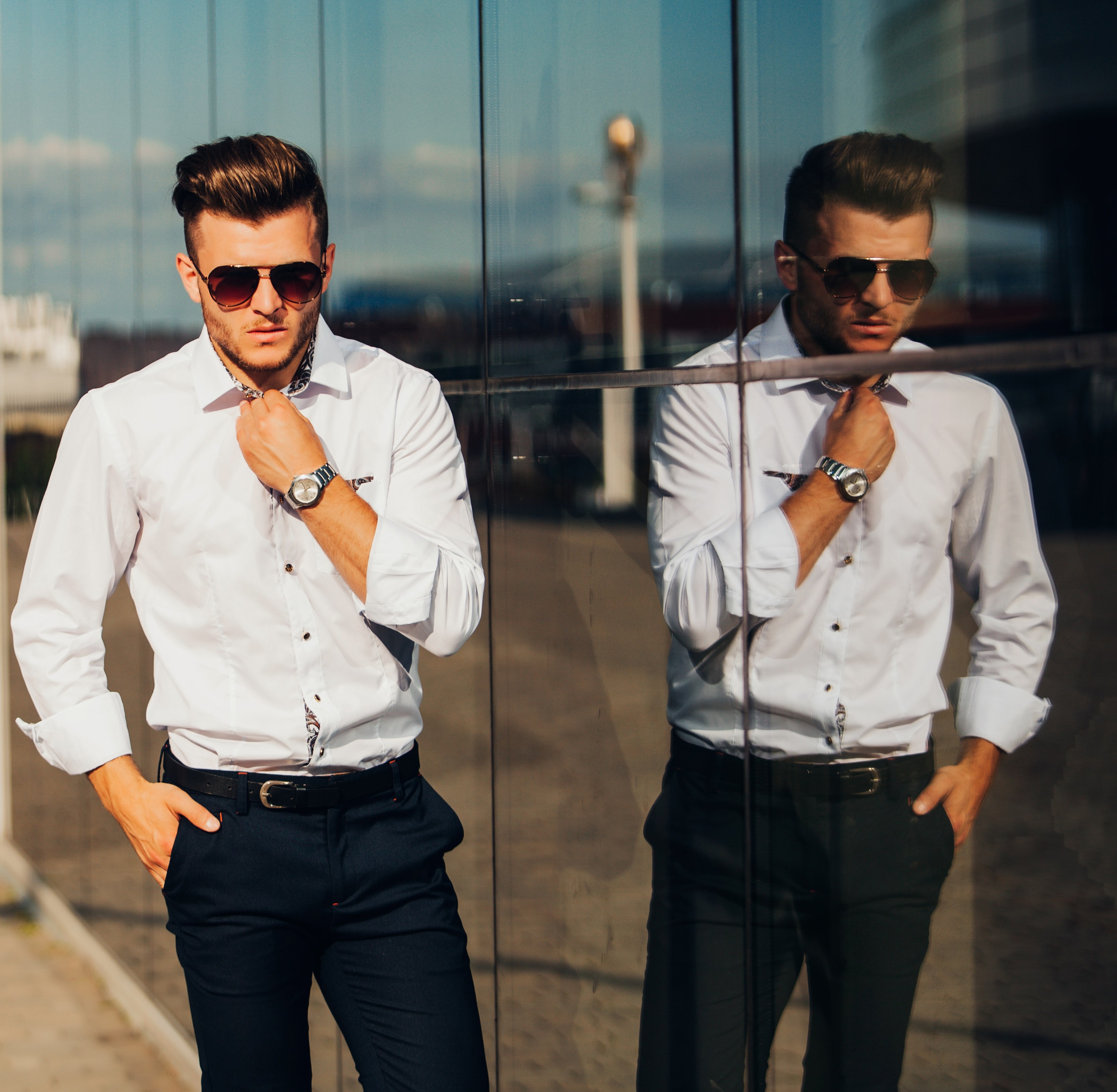 portrait of sexy handsome man in elegant clothes