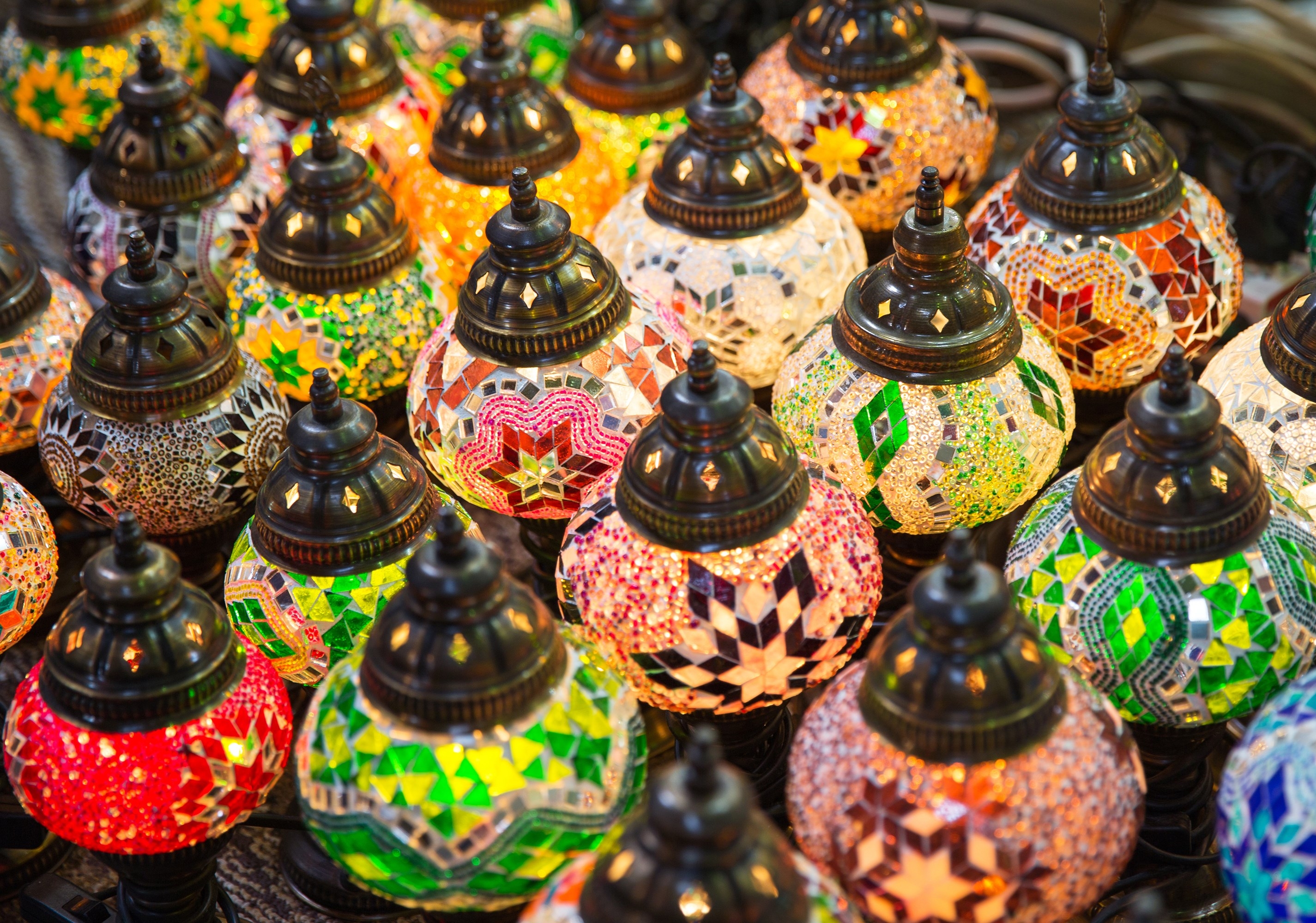 Traditional multicolored eastern glass lamps lighting on Asian market