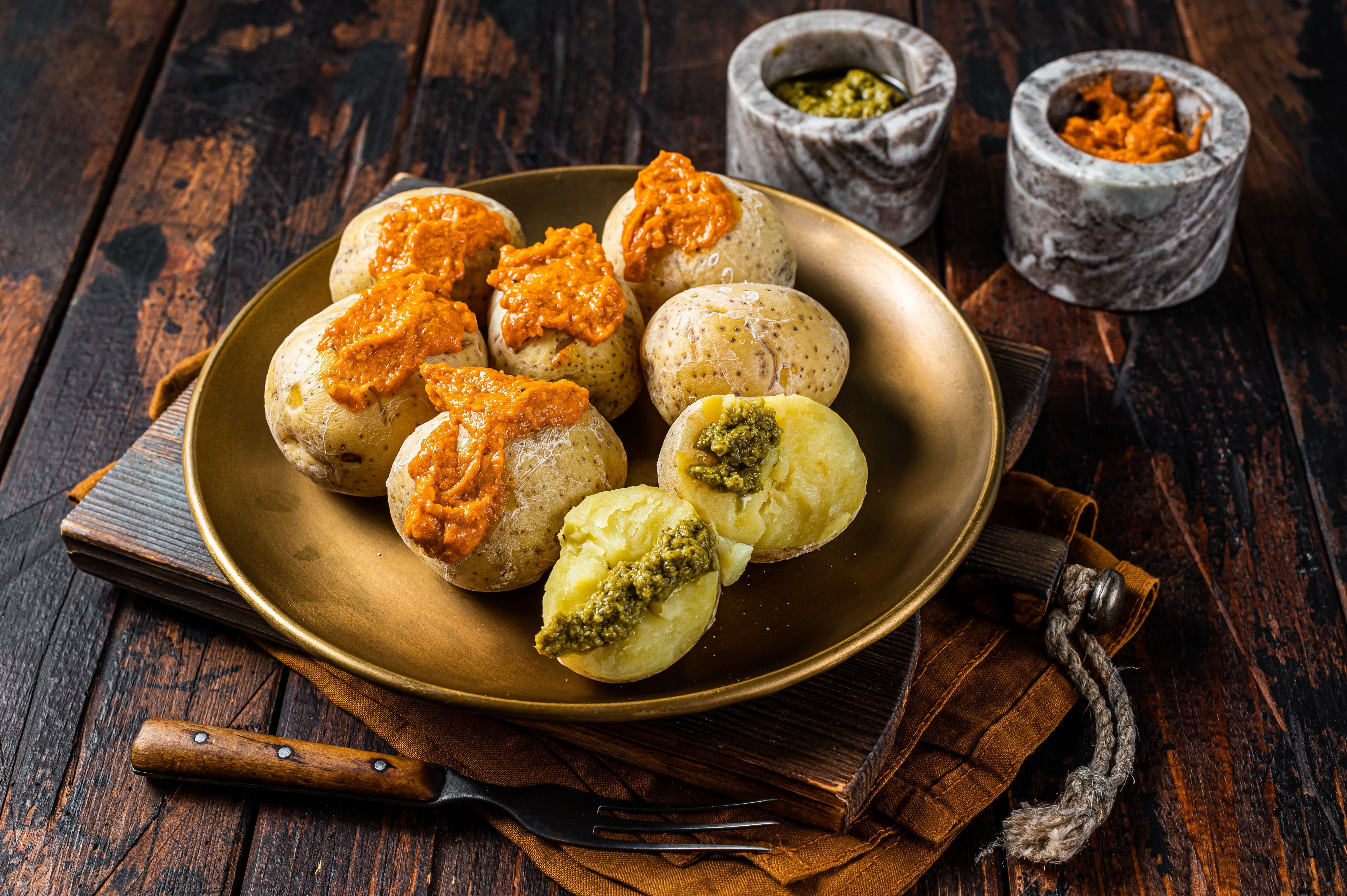 Canary Islands dish Papas Arrugadas wrinkly salty potatoes with and Mojo picon red spicy sauce