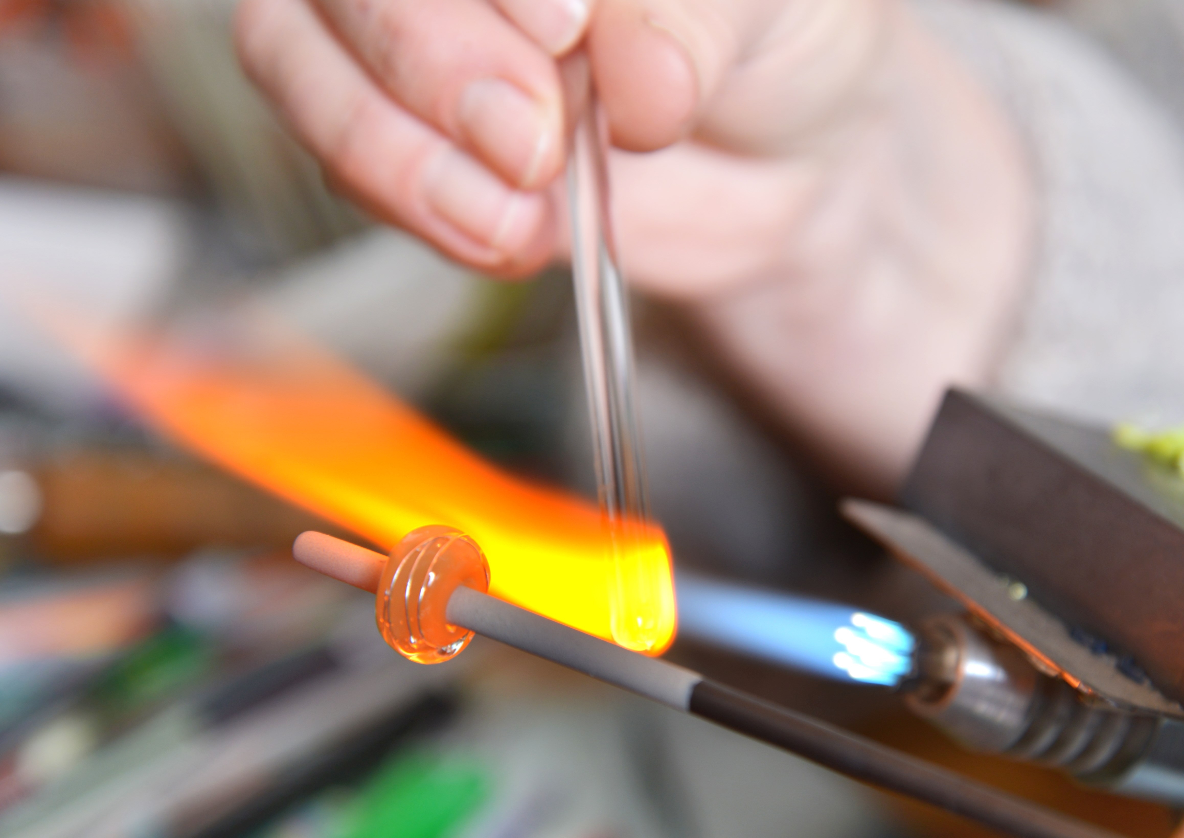 Glass Artist in her workshop.
