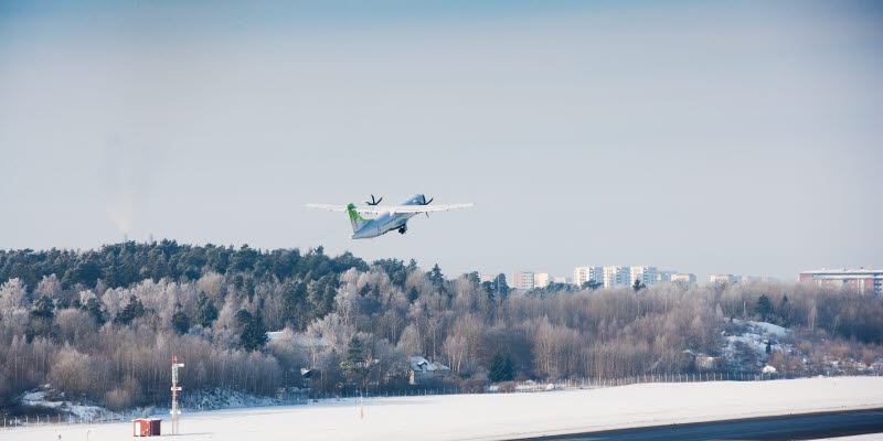 Airplane taking off at Bromma Stockholm Airport Airplane taking off at Bromma Stockholm Airport