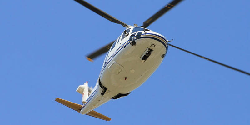 Helicopter in the air, looked at from underneath Helicopter in the air, looked at from underneath