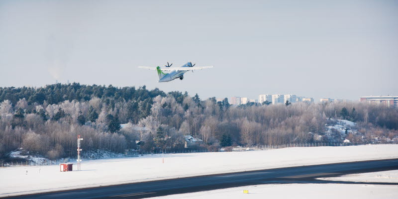 Airplane taking off at Bromma Stockholm Airport Airplane taking off at Bromma Stockholm Airport