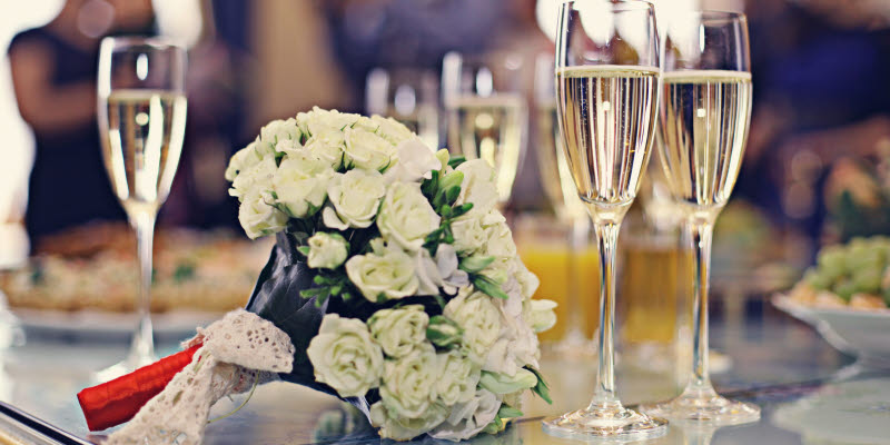 Bridal bouquet and champagne glasses Bridal bouquet and champagne glasses