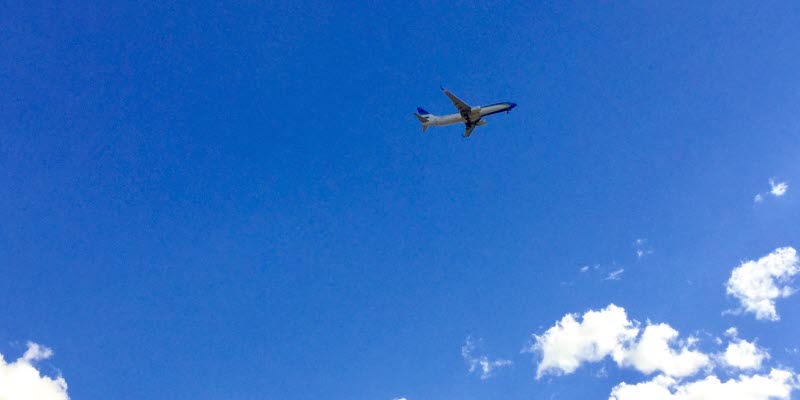 Airplane up in a blue sky above white clouds. Photo: Hans Uhrus Airplane up in a blue sky above white clouds. Photo: Hans Uhrus