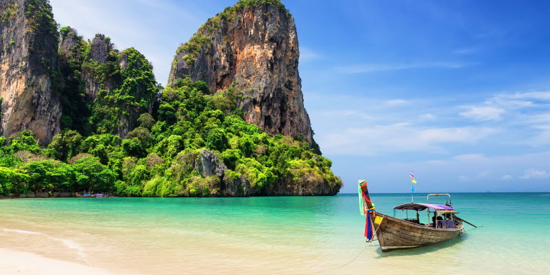 Beach in front of green mountains in Krabi Thailand Beach in front of green mountains in Krabi Thailand