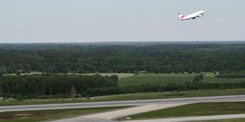 An airplane has just lifted and one taxi out on the Arlanda launcher An airplane has just lifted and one taxi out on the Arlanda launcher