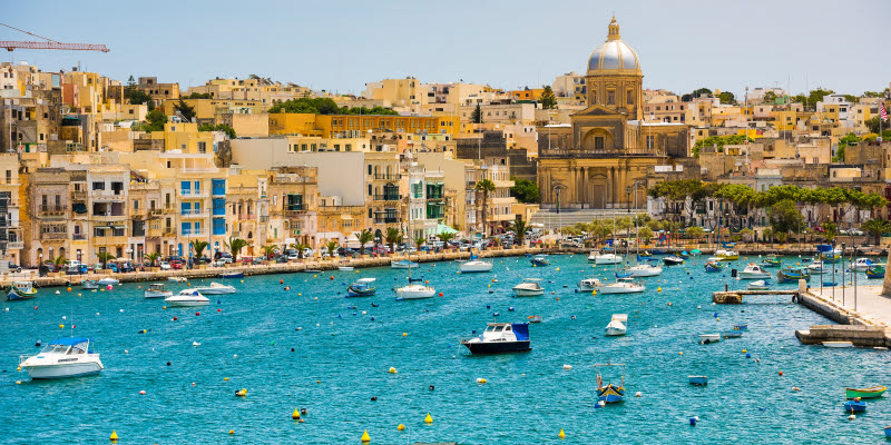 Boats in the water outside Valetta in Malta Boats in the water outside Valetta in Malta