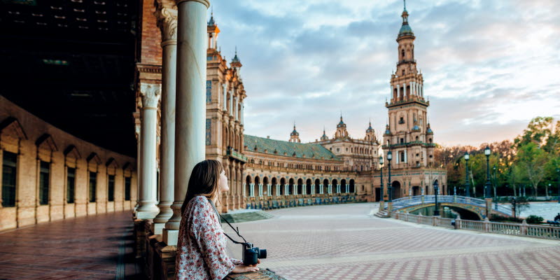 Girl standing at a square in Sevilla Girl standing at a square in Sevilla