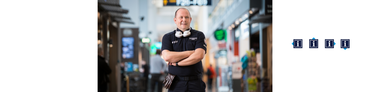 A man with a pair of headphones around his neck A man with a pair of headphones around his neck