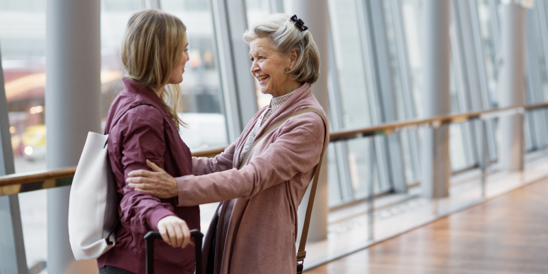 Two women meeting in SkyCity Arlanda Two women meeting in SkyCity Arlanda