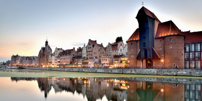Houses and a building near the water in Gdansk Houses and a building near the water in Gdansk