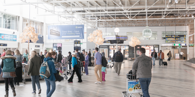 People wainting on their baggage at the baggage hall People wainting on their baggage at the baggage hall