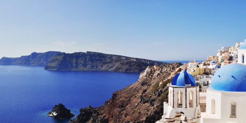 Greece, white houses and blue water Greece, white houses and blue water
