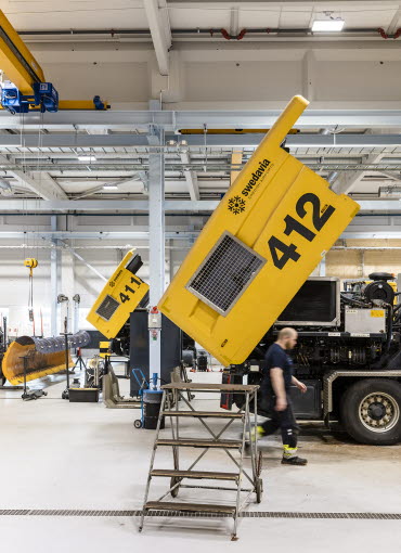 A yellow bus being repared A yellow bus being repared